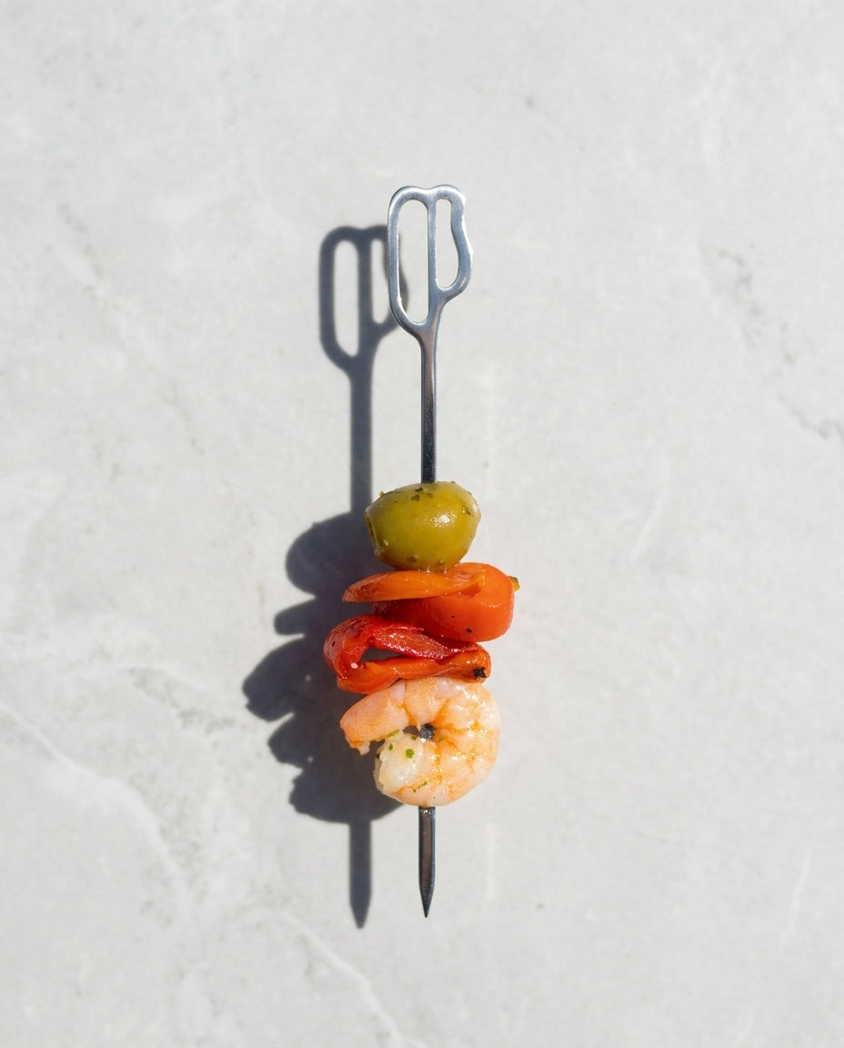 Brocheta de metal vertical de diseño exclusivo inspirado en la Casa Batlló, gildas de gamba 